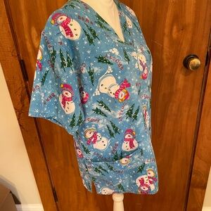 Woman’s scrubs Allheart size small Snowmen